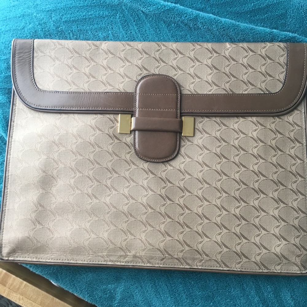 A vintage movado folder bag